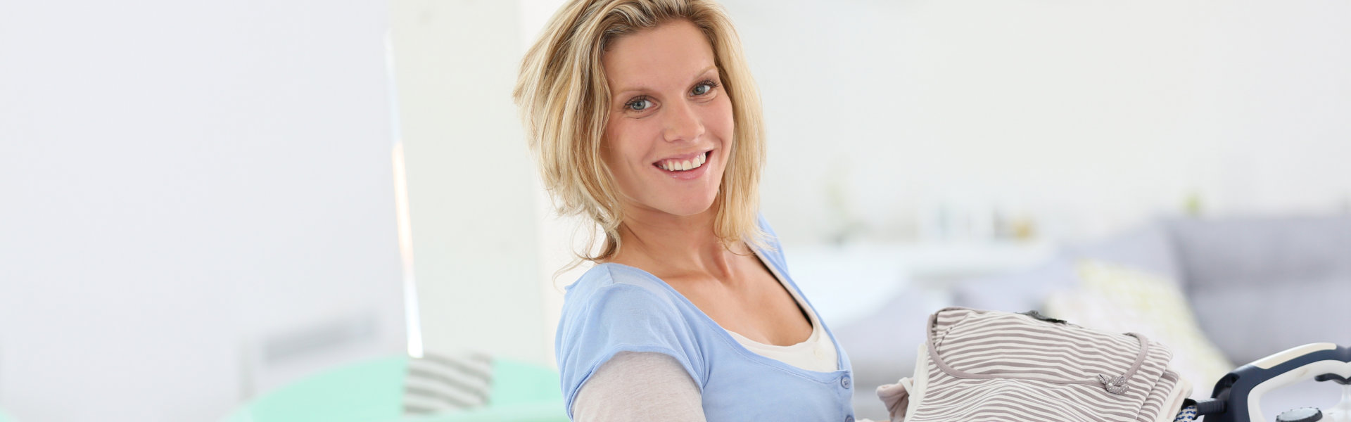 young woman doing laundry